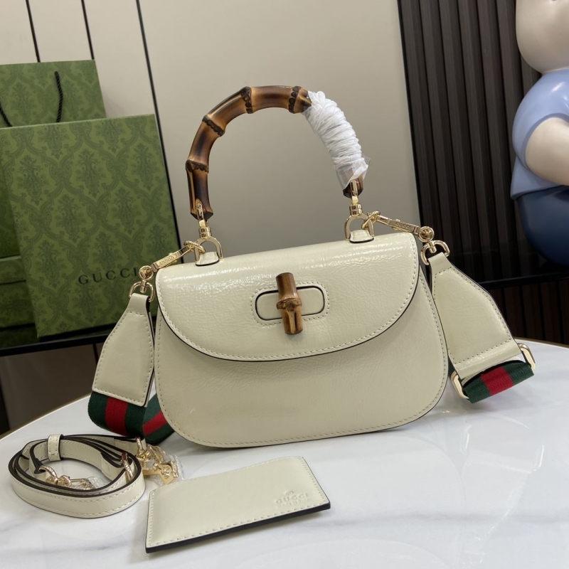 G*u*i top handle bags